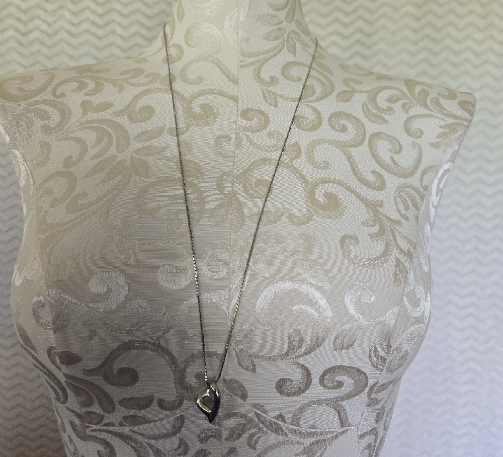Elegant Silver Heart Pendant Necklace